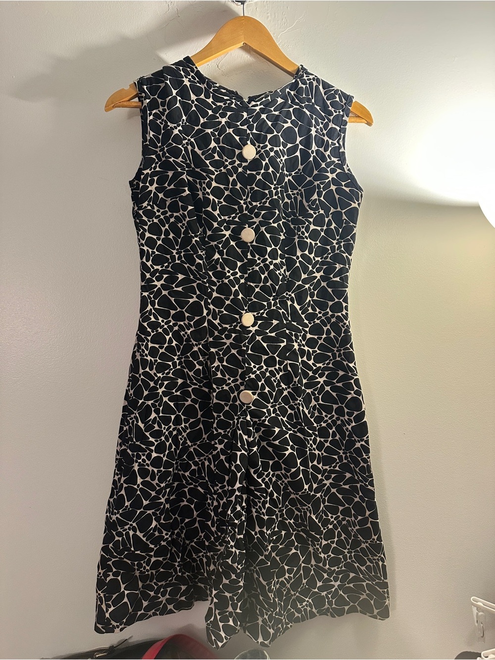 Sleeveless Black and White Patterned Dress with Button Front